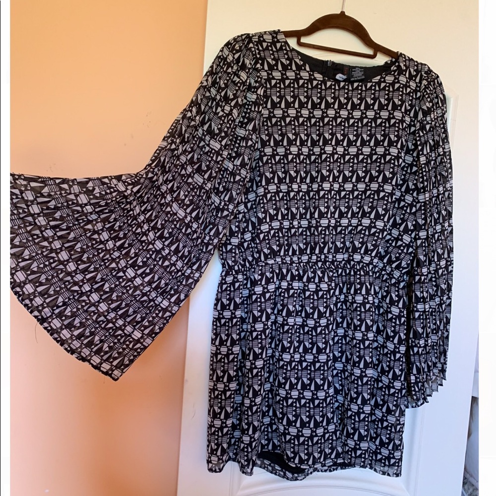 Romper with umbrella sleeves